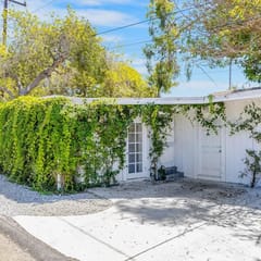 Vine-Covered Garden Suite | Queen + Patio